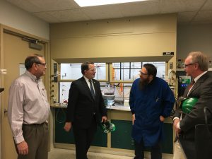 Senator Peters with Dr. Tom Guarr, Tom Bauer and a post doc fellow